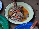 Lunch break...mostly small fish, some vegetables and Nsima